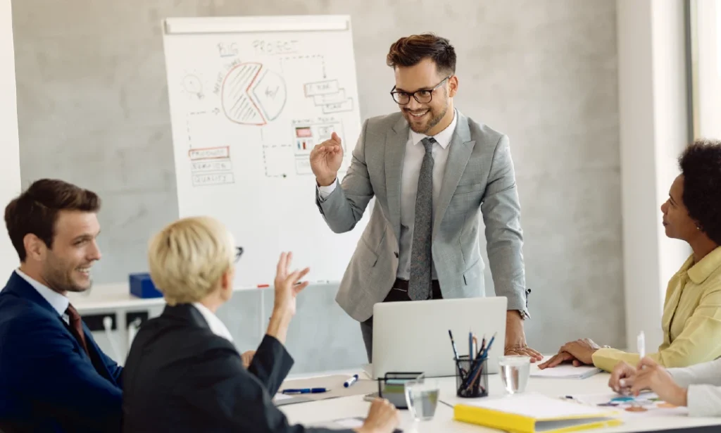 Professional CEO presenting business growth strategy to executive team.